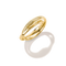 A polished yellow gold ring with a pavé-set row of small clear stones on one of its bands, shown on a clean white background with a soft shadow.