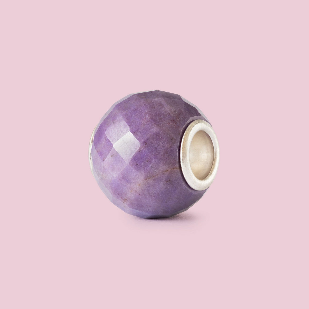 Purple marble-like sphere with a white center on a pink background