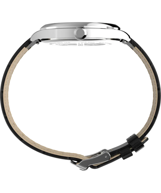 Close-up rear view of a round analog watch with a silver metal case and a black leather strap showing a beige underside, on a plain white background.