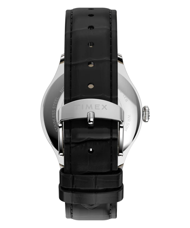 Back view of a wristwatch with a black alligator leather strap and a silver-tone IMEX buckle, shown on a solid white background.