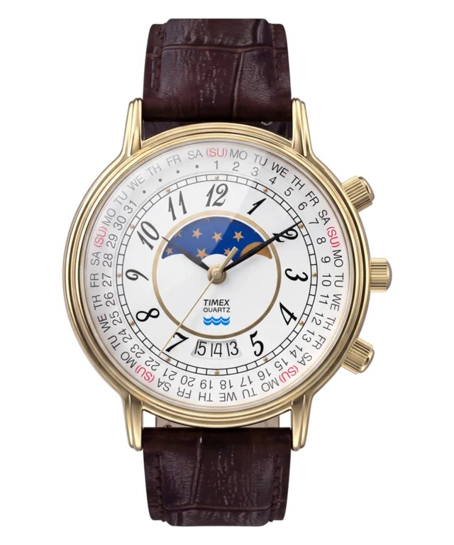 A Timex Swiss World Clock watch with a gold-tone case, white dial, brown leather strap, and a central moonphase indicator, shown on a plain white background.