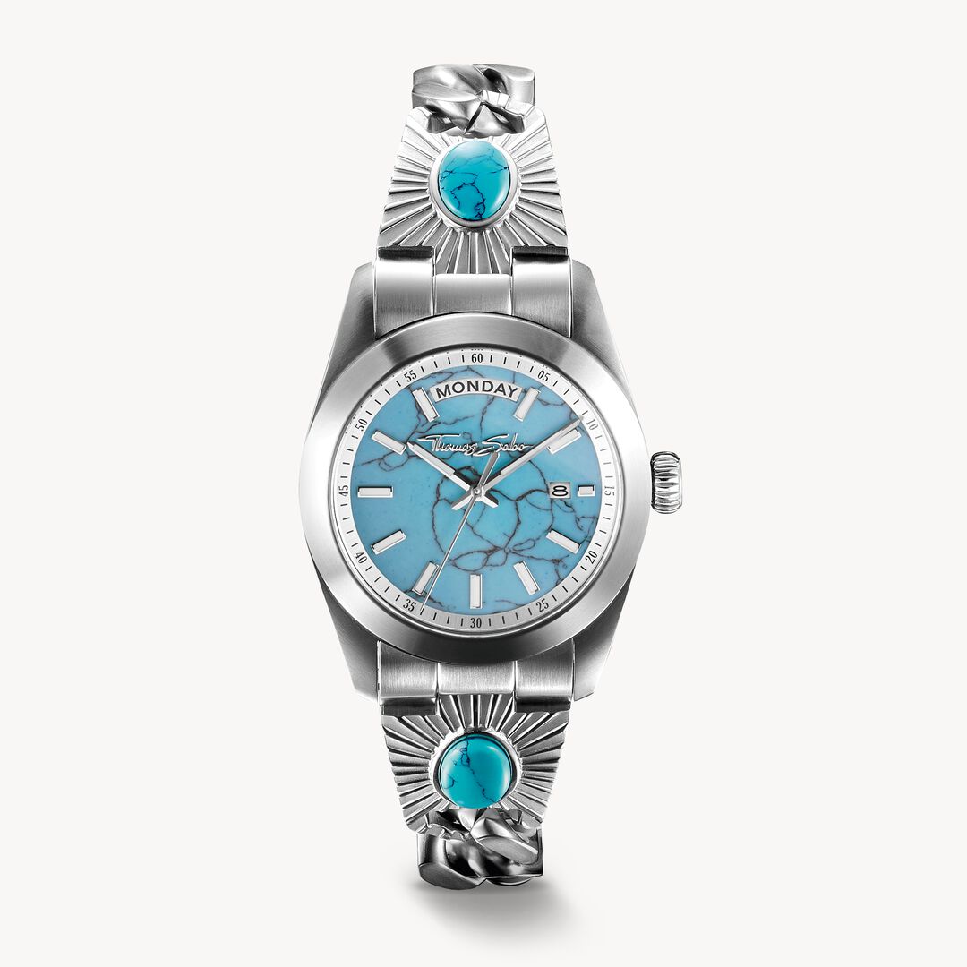 Luxury watch with turquoise accents on a white background
