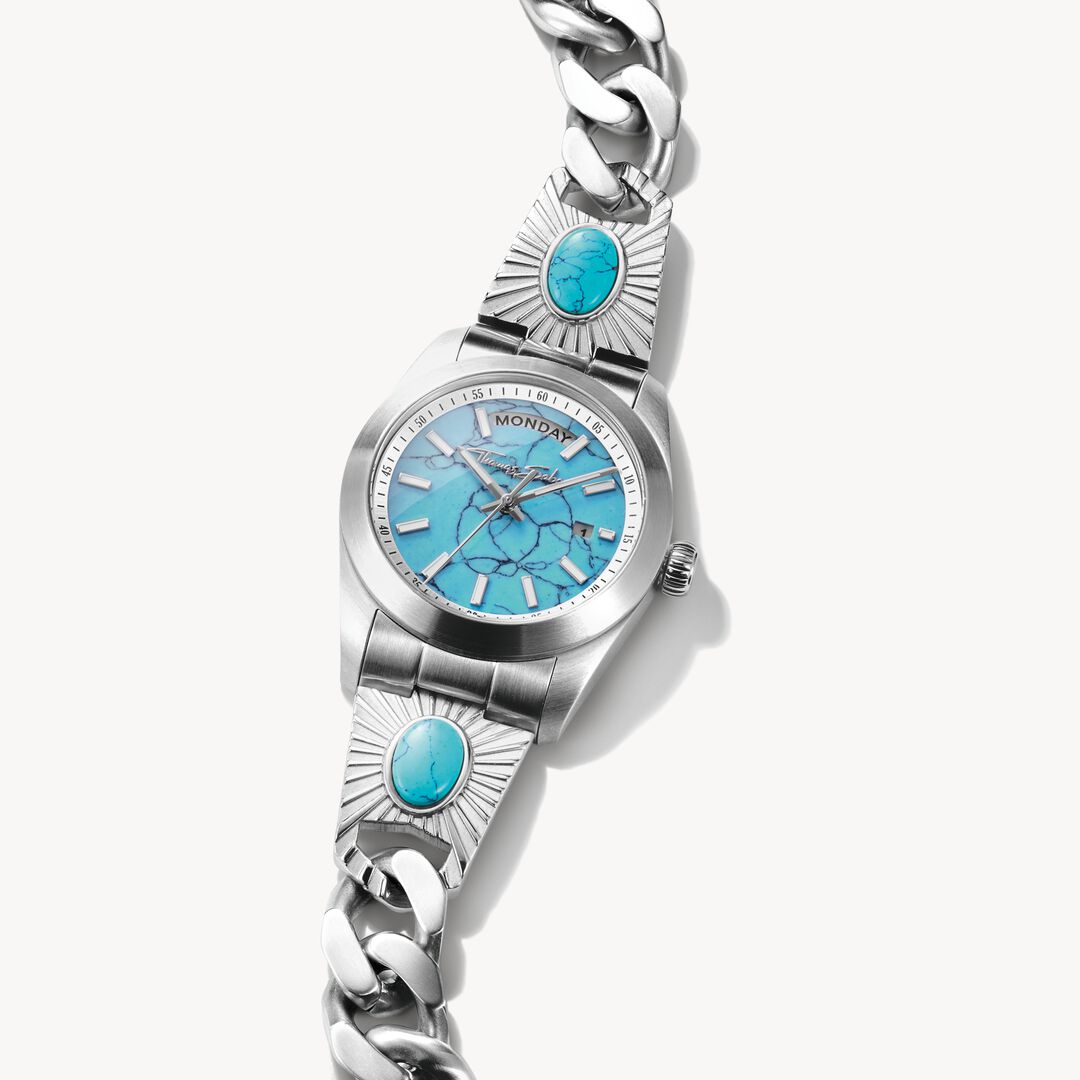 Silver watch with turquoise accents on a white background