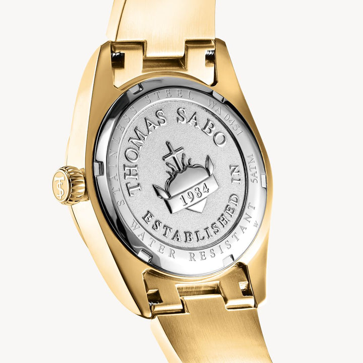 Gold watch with 'Thomas Sabo' branding on a white background