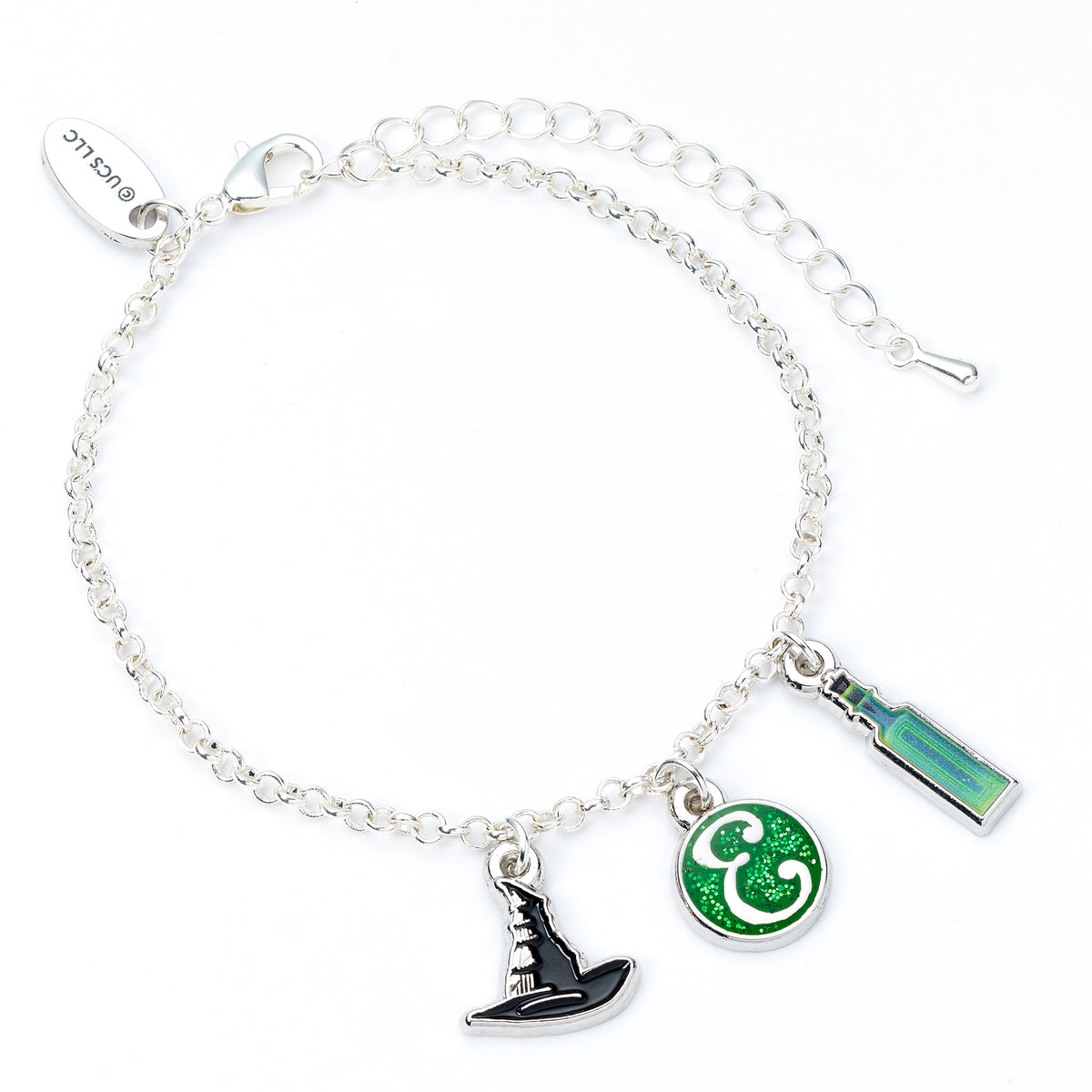 Silver bracelet with witch hat, green circle, and rectangular charm on a white background