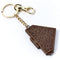 Decorative keychain with intricate design on a white background