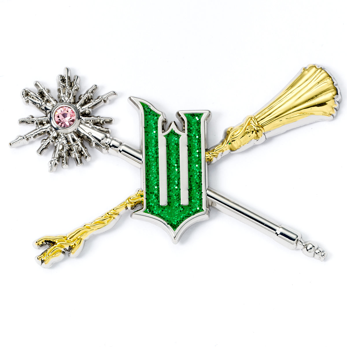 Decorative broom with green glittery letter 'W', pink gem, and gold accents on a white background