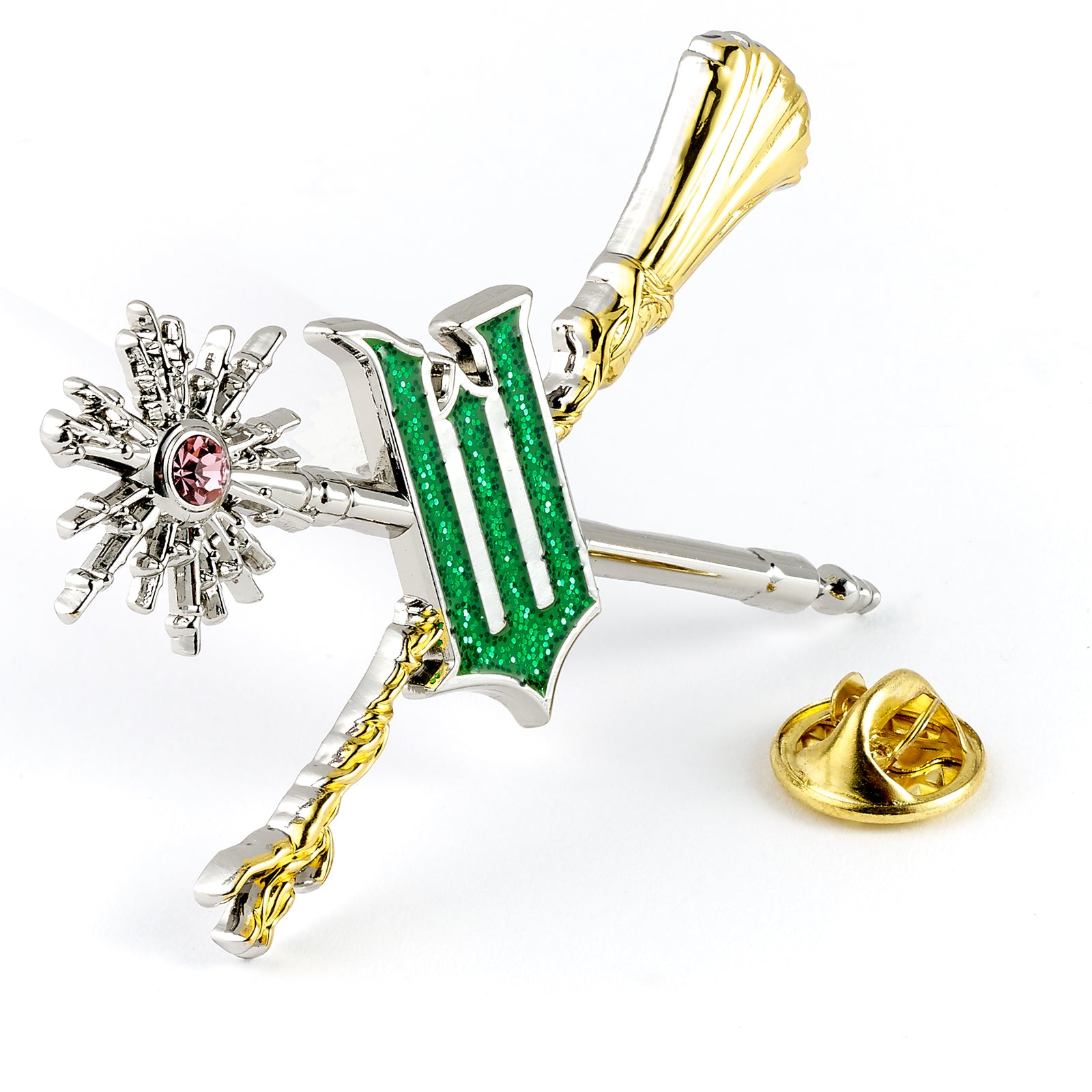 Decorative broom with green glittery letter 'W', pink gem, and gold accents on a white background