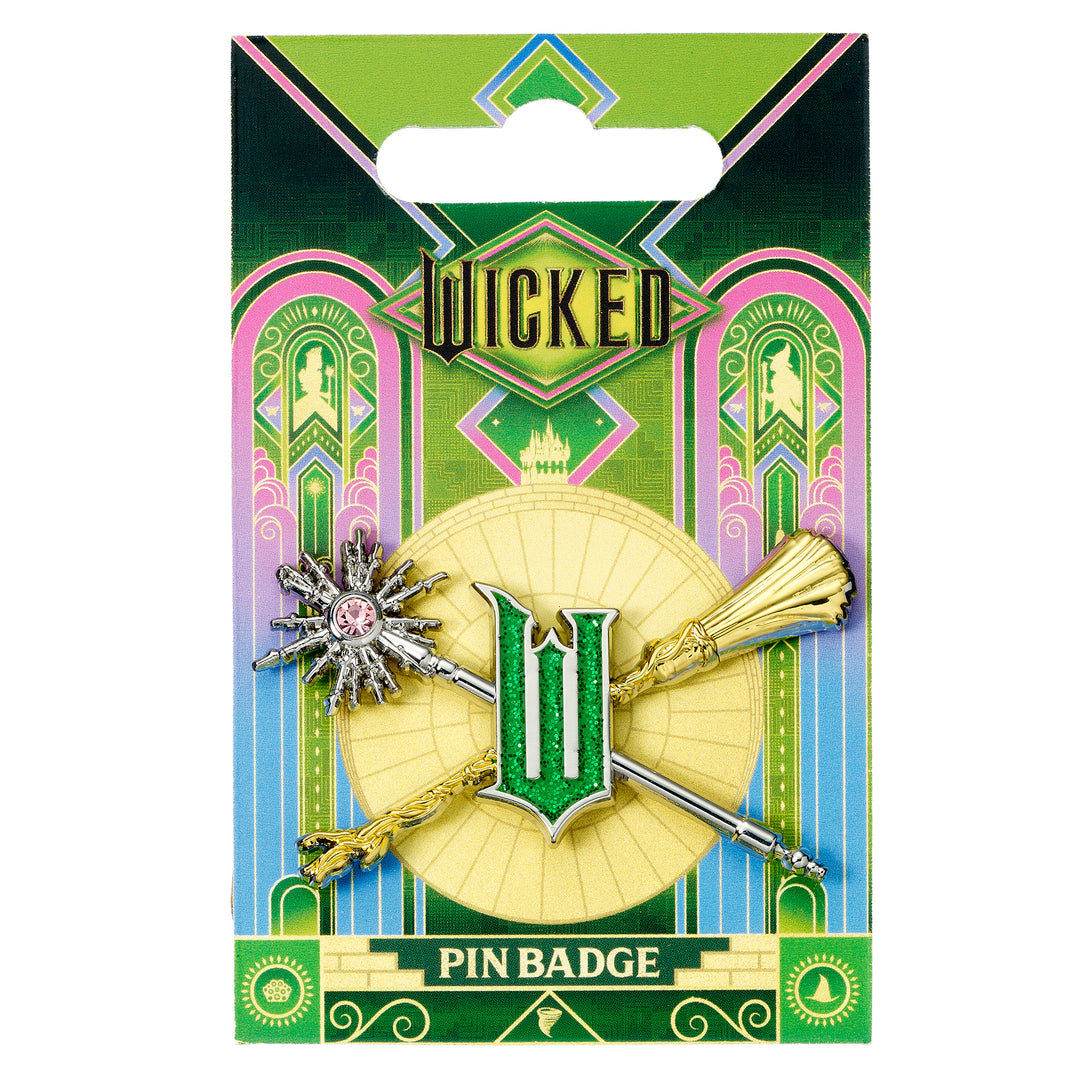 Wicked-themed pin badge on a decorative card with 'Wicked' branding.
