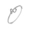 Silver bracelet with interlocking design on a white background