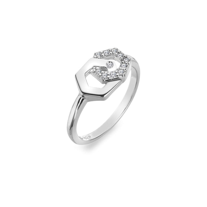 Silver ring with a heart-shaped design on a white background
