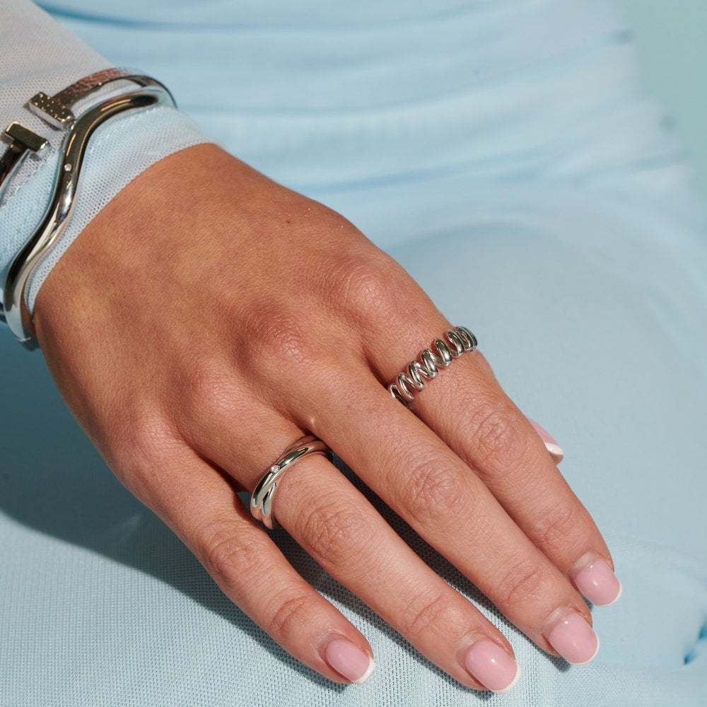 silver ring on white background