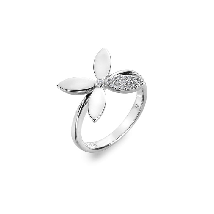 Silver ring with floral design on a white background