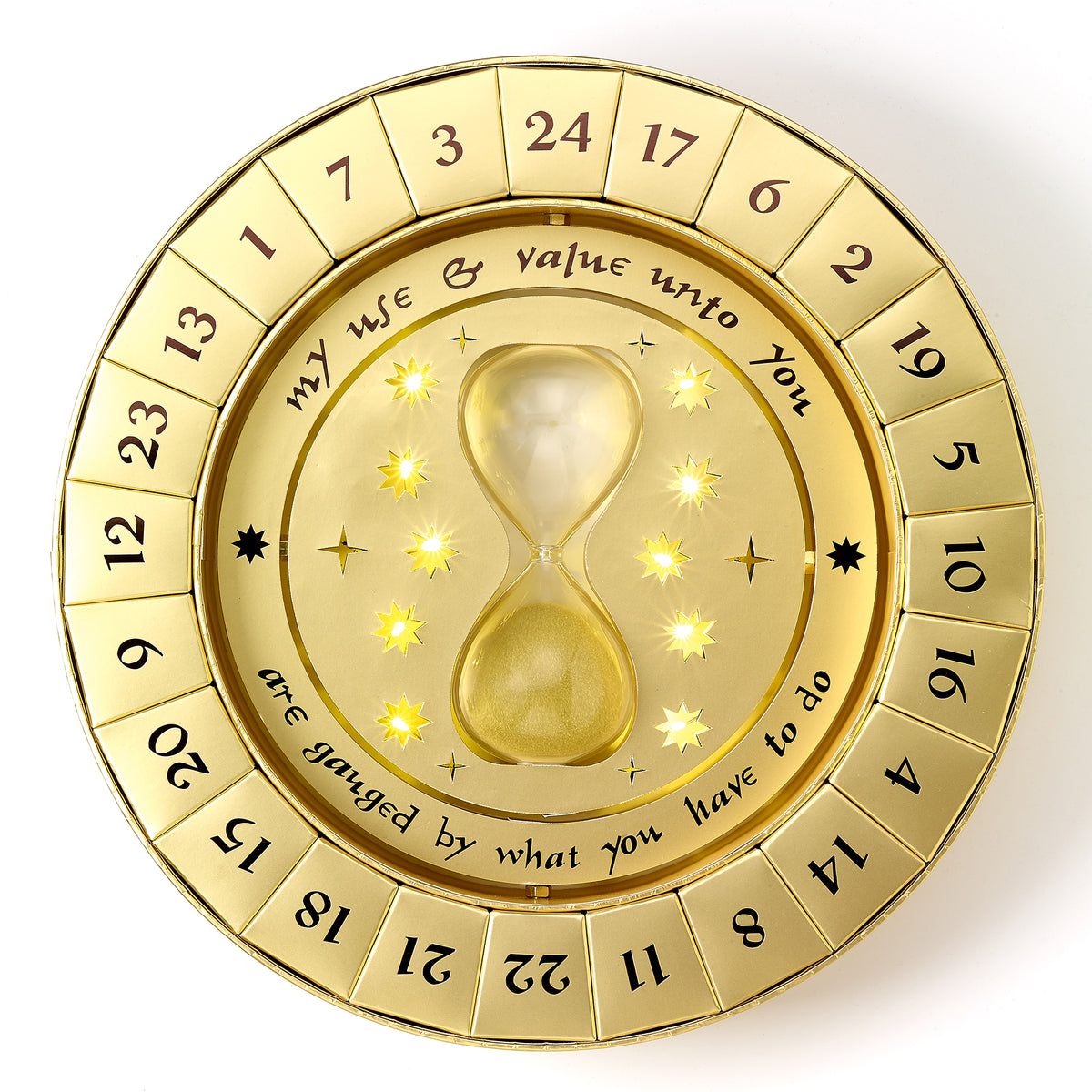 Gold circular decorative item with hourglass design and text on a white background