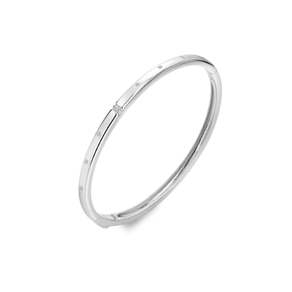 Sleek Sterling Silver Much Loved Slim Bangle DC217 showcasing a minimalist design with glimmering diamond accents, perfect for understated luxury.