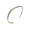 Two-tone gold and silver bangle on a white background