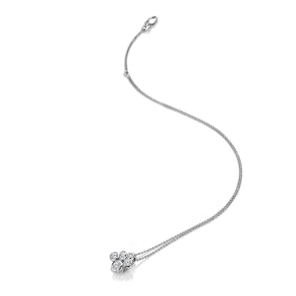 Close-up view of the Sterling Silver Tender Cluster Pendant featuring multiple White Topaz stones, highlighting the refined artistry and shimmering elegance.