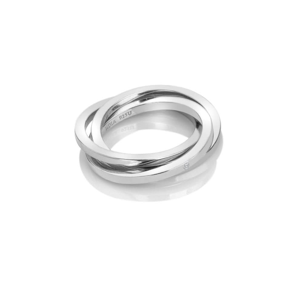 Elegant sterling silver trio ring featuring three interlocked sleek hoops, ideal for sophisticated jewelry collections.