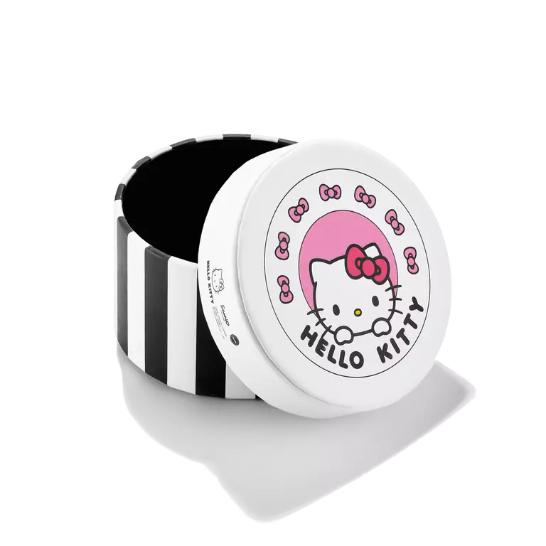 A round Hello Kitty branded container or box with a white lid featuring the Hello Kitty face, pink bow, and 'HELLO KITTY' text, next to a black-and-white striped cylindrical body, on a white background.